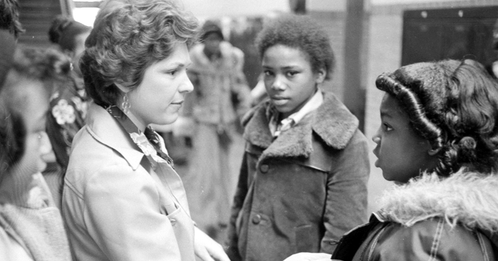 Parents and teachers greet children as they arrive at Detroit’s William Robinson School. Photo provided by Walter P. Reuther Library | Archives of Labor and Urban Affairs, Wayne State University