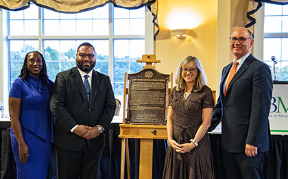 SBM President James W. Heath & Executive Director Peter Cunningham stand next to the 43rd Michigan Legal Milestone Plaque